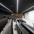 Amphitéâtre plateau mélaminé ou stratifié, sièges et tables abattables, structure acier noir ou gris - gamme Irvine - France bureau